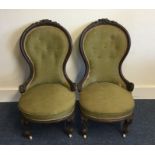 A pair of Victorian upholstered nursing chairs on