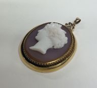 A large oval hardstone cameo depicting a lady's he