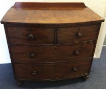 A Victorian mahogany bow front chest of four drawe