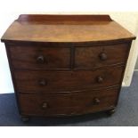 A Victorian mahogany bow front chest of four drawe