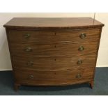 A mahogany bow front chest of drawers. Est. £80 -