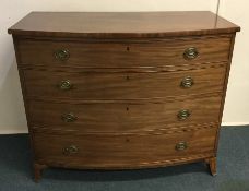 A mahogany bow front chest of drawers. Est. £80 -