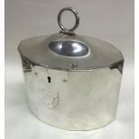 A heavy George III oval hexadecagonal silver tea c