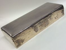 A large plain silver cigarette case with hinged to