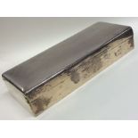 A large plain silver cigarette case with hinged to