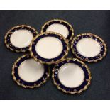 A decorative Royal Crown Derby dessert set with gi