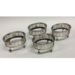 A set of four Georgian silver oval salts with pier