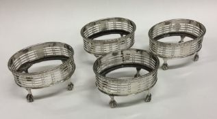 A set of four Georgian silver oval salts with pier