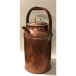 A large old copper and brass hot water urn. Est. £