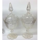 An attractive pair of good glass tapering pedestal