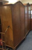A pair of burr walnut wardrobes together with matc