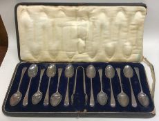 A heavy set of twelve OE pattern silver teaspoons.