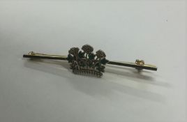 A 9 carat brooch in the form of flowers. Approx. 4