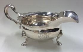 A good George II silver sauce boat with card cut r