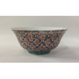 An unusual Chinese rice bowl decorated in bright c