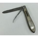 A silver and MOP fruit knife. Birmingham. Approx.
