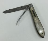 A silver and MOP fruit knife. Birmingham. Approx.