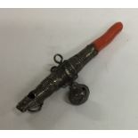 A Georgian silver and coral rattle. Approx. 15 gra