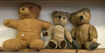 Three old teddy bears. Est. £20 - £30.