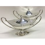 A good pair of Georgian faceted silver tureens and