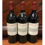 Three x 750 ml bottles of Domaine de Chevalier Pes