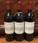 Three x 750 ml bottles of Domaine de Chevalier Pes