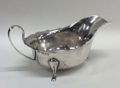 An Edwardian silver sauce boat. Sheffield. By EV.