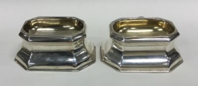 A pair of early Georgian silver trencher salts wit
