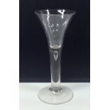 A rare Georgian tapering wine glass with plain ste
