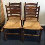 A set of four cane seated chairs. Est. £20 - £30.