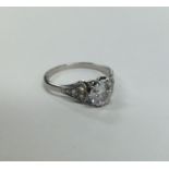 A diamond single stone ring in platinum claw mount