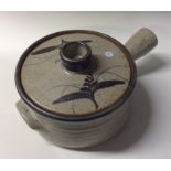 LOWERDOWN: A David Leach pottery saucepan with hol