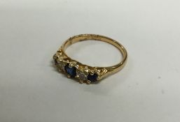 A good sapphire and diamond nine stone ring in 18