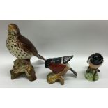 Three Beswick figures of birds. Est. £15 - £20.