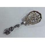 A good quality pierced silver caddy spoon with scr