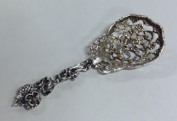 A good quality pierced silver caddy spoon with scr