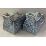 A pair of Chinese blue and white water jugs with s