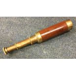 A brass mounted telescope by Ross of London. Est.