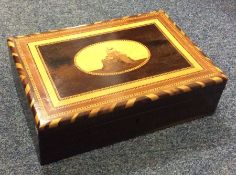 A Madeira inlaid sewing box with fitted interior.