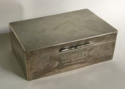 An engine turned silver cigarette box. Birmingham.