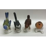 Four Goebel bird ornaments. Est. £15 - £20.