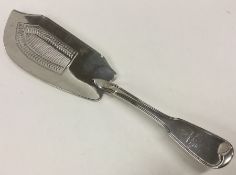 A heavy George III silver fish slice with pierced