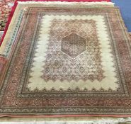 An old rug decorated in bright colours. Est. £30 -