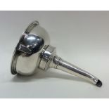 A good quality crested silver wine funnel with tur