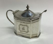 A large bright cut silver engraved mustard pot. Lo
