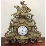 A spelter mantle clock on pedestal base. Est. £30