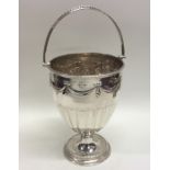 An attractive Victorian silver swing handled baske