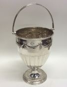 An attractive Victorian silver swing handled baske