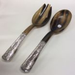 A pair of Continental silver and horn salad server