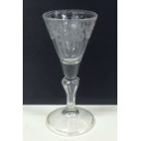 A rare Georgian tapering wine glass with etched bo